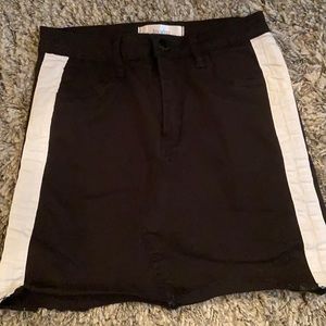 Black denim skirt with white trim down sides